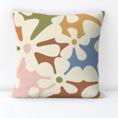 a pillow with an abstract design on it