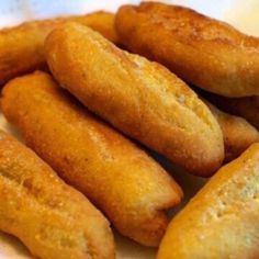 some fried food is on a white plate