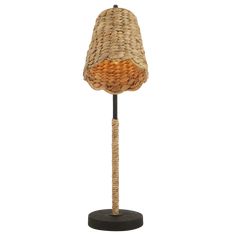 a lamp that is on top of a wooden base and has a rope wrapped around it