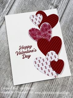 a valentine's day card with hearts on it