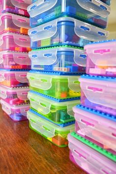 plastic storage containers stacked on top of each other