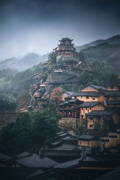 a mountain with many buildings on it