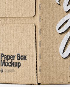 an open cardboard box with white paper stickers on it