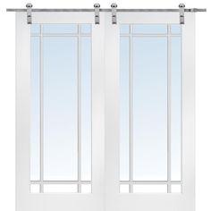 the double doors are closed and ready to be used for sliding glass doors, with black hardware