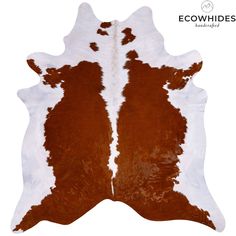 a brown and white cowhide rug on a white background