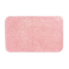 a pink bath mat on a white background