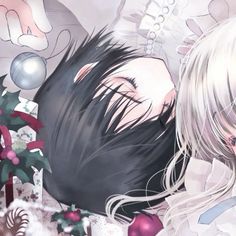 two anime characters laying next to each other in front of a christmas tree and presents