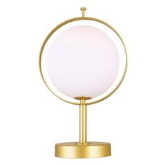 an illuminated table lamp with a white ball on it's base and gold metal stand