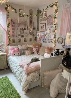 a dog laying on top of a bed in a bedroom next to two stuffed animals