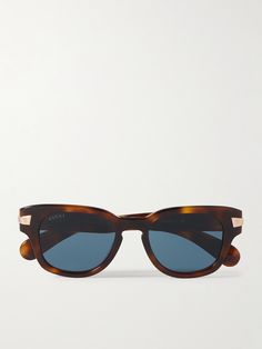 Simple and timeless, Gucci Eyewear's sunglasses are made from tortoiseshell acetate in a classic D-frame shape. The hinges are detailed with gold-tone hardware that sleekly extends onto the temples. Gucci Tortoiseshell Sunglasses For Women, Modern Gucci Sunglasses In Acetate, Luxury Gucci Tortoiseshell Sunglasses, Luxury Modern Tortoiseshell Sunglasses, Gucci Tinted Acetate Sunglasses, Gucci Eyewear, Cycling Accessories, John Hardy, Eyewear Accessories