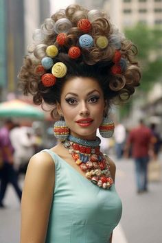 The Beehive hairstyle was popularized in the 1960s and has since become an iconic symbol of that era. Its height and volume create a bold and dramatic look that is perfect for special occasions or a night out on the town. This hairstyle is a classic choice for those looking to make a statement with their hair. The Beehive hairstyle has stood the test of time and continues to be a source of inspiration for modern hairstylists. #BeehiveHairstyle #RetroHair #1960sFashion Diy Beehive, 1960s Hairstyles, Yarn Wigs, Beehive Hairstyle, Yarn Wig, 1960’s Fashion, 1960s Hair