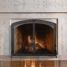 a fireplace with a fire burning in it