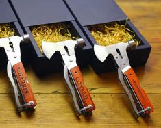 three pairs of swiss army style pliers open with noodles in them