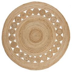 a round rug with circles on the bottom and one circle in the middle, is made from jute