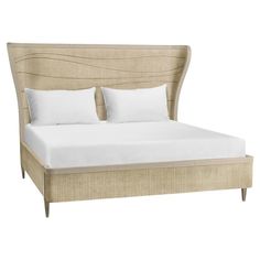 an upholstered bed with white pillows and linens on it, against a white background