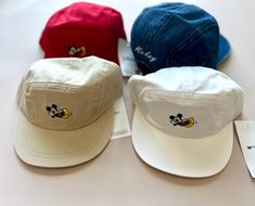 Embroidered Mickey Mouse Logo on Five Panel Hat. "Mickey" Embroidered on back. Adjustable Strap. 52cm Head Circumference (~3-5y) Disney Items are Final Sale.