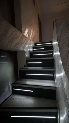 the stairs are lit up with leds to give them more light than they appear