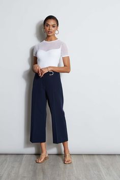 Springs "IT" pant is a chic update to the relaxed wide leg pant. We're obsessed with its cropped length, higher waist silhouette with graphic D-ring belt. Wear it with a knit or layered with a blazer, it will become a favorite in your wardrobe. T-Tahari Crepe Wide Leg Cropped Pant with D-Ring Belt Detail Runs true to Size Model is 5'9" and wearing size 2 Dry Clean Only Imported Style #: THF44003 Wide Leg Twill Pants Outfit, Clean Work Outfits, Cropped Wide Leg Trousers Outfit, Wide Cropped Pants Outfit, Wide Leg Cropped Pants Outfit, Cropped Wide Leg Pants Outfit, Cropped Pants Outfit, Wide Cropped Pants, Wide Leg Trousers Outfit