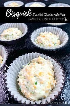 several muffins in paper cups sitting on top of a black counter with the words, biscuit zucchini cheddar mitts waking on sunshine recipes