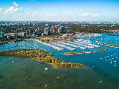 an aerial view of the marina and city