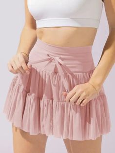 This pleated skirt will give you a high waisted look with its lace-up panel detail. And with built-in shorts, you'll feel confident and covered while still rocking the trend. Perfect for a flirty and chic look! Dirndl Outfit, Athletic Skirts, Strapless Tube Dress, Trendy Spring Outfits, Bandeau Tops, 1920s Flapper Dress, Plunge Dress, Short Denim Skirt, Short Playsuit