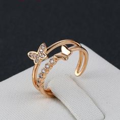 Love Butterflies? Get these premium gold-plated Cubic Zirconia Resizable Butterfly Ring today. Reward yourself with this self-propelled flower to keep yourself joyful every day. Brand Name: ZHOUYANG Origin: CN(Origin) Metals Type: Copper Gender: Women Material: Crystal Style: Trendy Rings Type: Wedding Bands Shape\pattern: Insect Model Number: ZYR349-5 ZYR350-1 Setting Type: Tension Setting Occasion: party Main stone: Crystal Plating: Rose gold color/ silver color Environmental Standards: Europe Love Butterflies, Trendy Rings, Reward Yourself, Trendy Ring, Butterfly Ring, Wedding Band Sets, Copper Material, Stone Crystal, Rose Gold Color