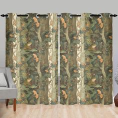 the curtains are decorated with flowers and leaves in green, brown, yellow and beige colors