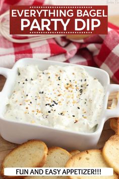 a white dish filled with cream cheese and crackers