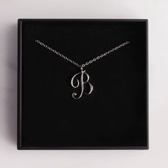 Letter B Initial Necklace - Cursive "B" initial silver pendant - Personalized initial silver pendant for women / Gift for her / for mom Dainty "B" initial. Perfect every day necklace. Lovely gift for your self, sister, bridesmaids, new mom. Pendant: Base metal is brass and silver plated on top. Chain is 18 inches, sterling silver. Note: model shots might show a different initial, only to illustrate overall look and length of the chain. This listing is for the "B" initial. B Cursive, B Initial Necklace, Cursive B, Every Day Necklace, B Initial, Mom Pendant, Initial Necklace Silver, Initial Pendant Necklace, Pendant For Women