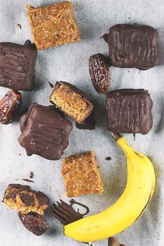 a banana and some chocolate bars on a table