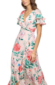 Colorful blooms add a bold pop to a textured maxi dress framed by fluttery sleeves and finished with a high-low hem. 49" length (size 4) Hidden back zip closure Surplice V-neck
 Short sleeves 100% polyester Hand wash, dry flat Imported Model stats: 5'10" height, 32" bust, 25" waist, 36" hip. Model is wearing size 4. Textured Maxi Dress, Formal Tops, High Low Maxi Dress, Corset Mini Dress, Green Bridesmaid Dresses, Leopard Dress, Chiffon Maxi, Maxi Dresses Casual, Red Mini Dress