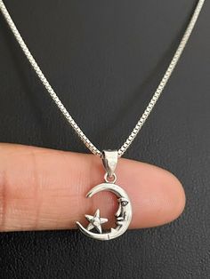 "Minimalist a d Dainty Sterling Silver Moon & Star Necklace, Celestial Necklace NECKLACE FEATURES: Metal: All components are made from solid .925 Sterling Silver Model is wearing 16\" in length solid .925 Sterling Silver Chain Length available: 16\", 18\" or 20\" Measurements For Moon & Star Pendant: Height: 18.7mm Width: 12.3mm Thickness: 2.1mm Please send me a convo if you have any questions before placing your order. Please also view my policy before purchasing. Please visit my storef Black Star Necklace, Star Necklace Aesthetic, Silver Moon Necklace, Moon Star Pendant, Moon Star Necklace, Silver Model, Necklace Moon, Celestial Necklace, Jewelry Accessories Ideas