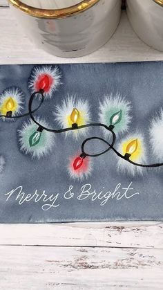 a blue christmas door mat with lights on it and merry and bright written across the front