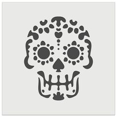 a black and white image of a skull with skulls on it's face, which is