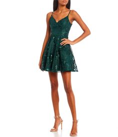 From City Vibe, this dress features:lace sequin embroidered mesh overlay fabricationV-necklinesleeveless stylingfull, pleated skirtfit-and-flare silhouettezippered back34" lengthabove kneepolyesterdry cleanImported. Homecoming Dresses Fit And Flare, Light Green Hoco Dress, Dillards Homecoming Dresses, Emerald Green Homecoming Dresses, Homecoming Dresses Green, Best Homecoming Dresses, Green Hoco Dress, Fitted Homecoming Dresses, Hoco Dresses Flowy