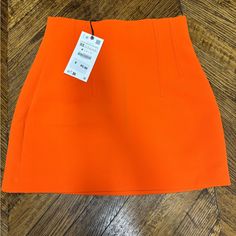 Bnwt Zara Bright Orange Mini Skirt. Perfect Condition Just Does Not Fit. Trendy Fitted Zara Skort, Fitted High-waist Orange Mini Skirt, Fitted High Waist Orange Mini Skirt, Casual Orange Pencil Skirt, Orange Skirt For Workwear In Summer, Fitted Orange Mini Skirt For Spring, Zara Stretch Trendy Mini Skirt, Trendy Stretch Zara Mini Skirt, Trendy Stretch Mini Skirt By Zara