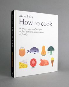 a cookbook with an image of different food items on it's front cover