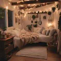 a bed room with a neatly made bed and lots of lights