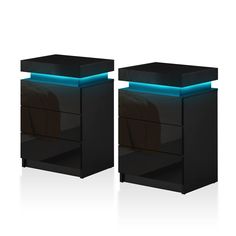 PRICES MAY VARY. Adjustable LED Lights: This nightstand with LED lights has 4 lighting modes and 16 adjustable colors in 4 basic colors: blue, red, green and white. Equipped with remote control which is very convenient at night. The night stand with built-in LED lights not only create a beautiful and romantic ambience but also a perfect decoration for your room High Gloss Front Design: The bedside table is made of high quality MDF wood boards. The front surface is designed in high gloss and the Bachelor Pad Decor Bedroom, Black Nightstands, Bachelor Pad Decor, Led Azul, Modern Nightstands, Black Nightstand, Table For Bedroom, Nightstand Set Of 2, Wood Boards