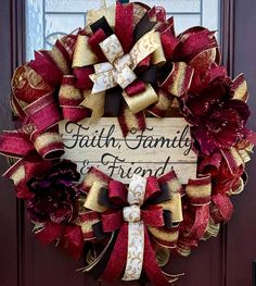 a red and gold wreath with the words faith family and friend on it