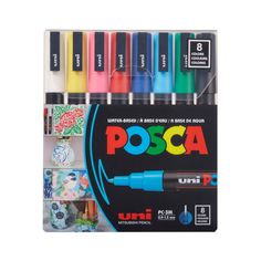 a box of 12 assorted posca markers