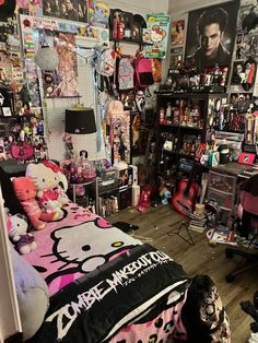 a bedroom with hello kitty bedding and lots of stuff on the wall behind it