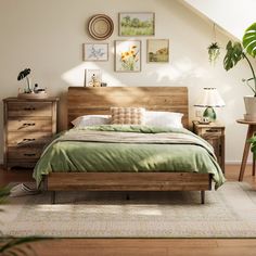 a bed sitting in a bedroom next to a wooden dresser