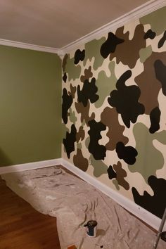 a room that has been painted with camouflage paint