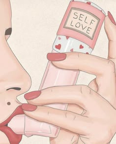 a woman holding a pink bottle with the word self love written on it and her tongue sticking out