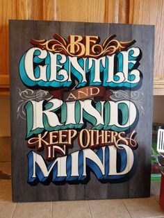 a wooden sign that says be gentle and kind of keep others in mind