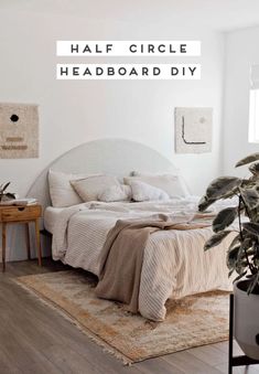 a bedroom with white walls and wood flooring is featured in the article half circle headboard diy