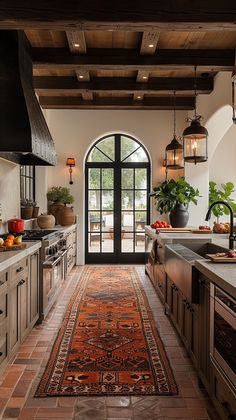 a kitchen with an area rug on the floor