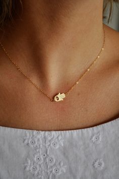 Tiny Gold Sideways Hamsa Necklace, meant to ward off the evil eye Hamsa Necklace, A Necklace, Necklace Gold, Diamond Necklace, Jewelry Box, A Woman, Jewelry Accessories, Chain Necklace