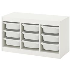 a white storage unit with plastic containers on top and bottom drawers in the middle, against a white background